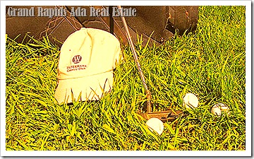 golf hat, putter, balls