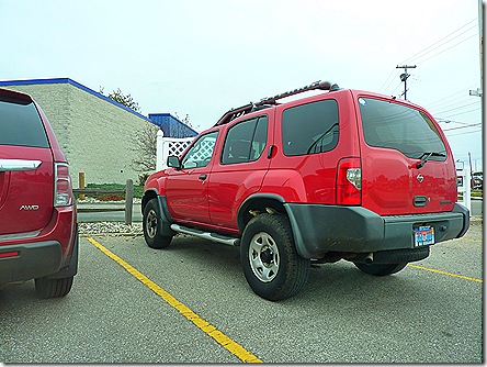 Red SUV parked 
